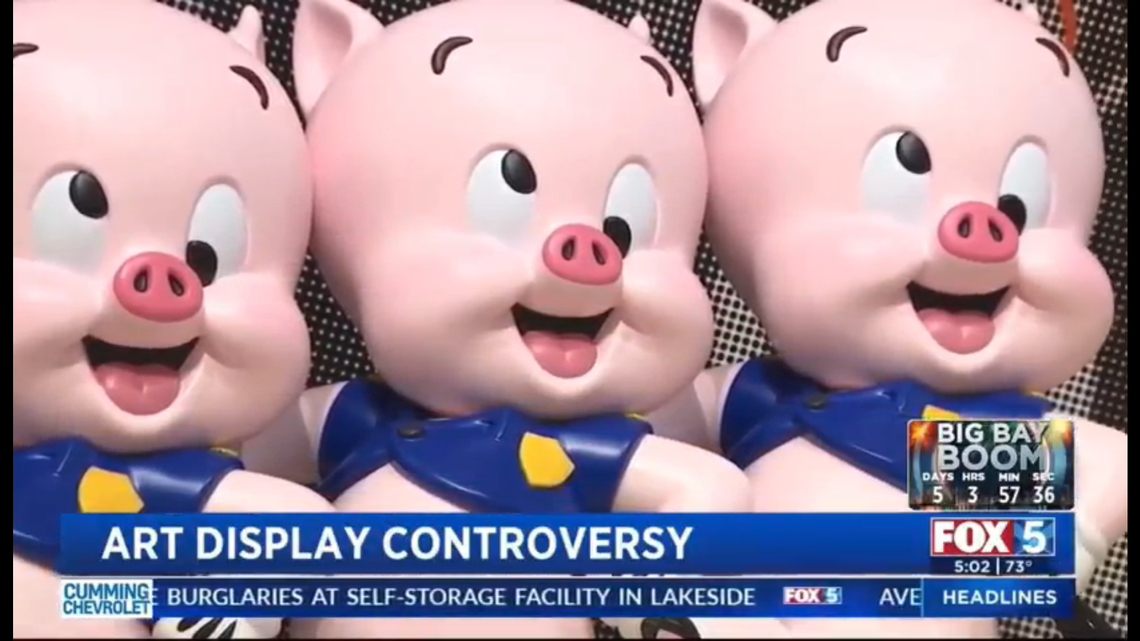 “Three Slick Pigs” is meant to criticize some police officers’ abuse of power, artist OG Slick said.