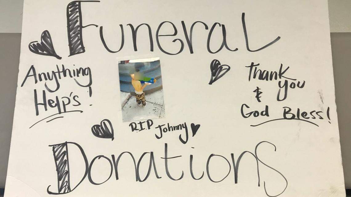 All three men were holding signs claiming to seek donations for the child, who was actually alive, police said.