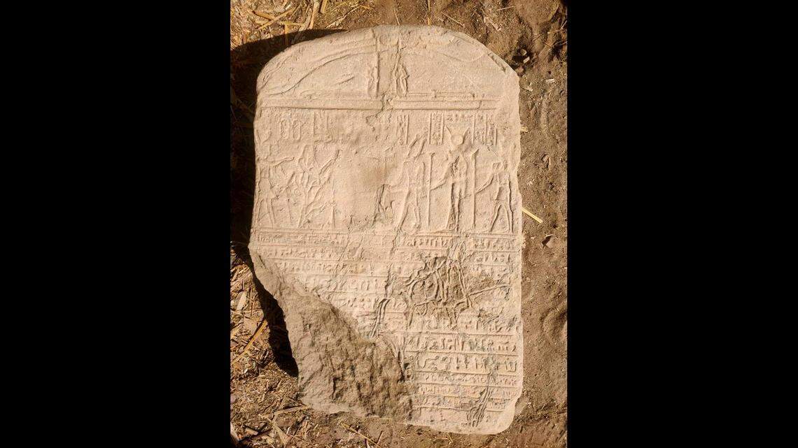 The tablet was found beneath the sphinx statue, experts said.