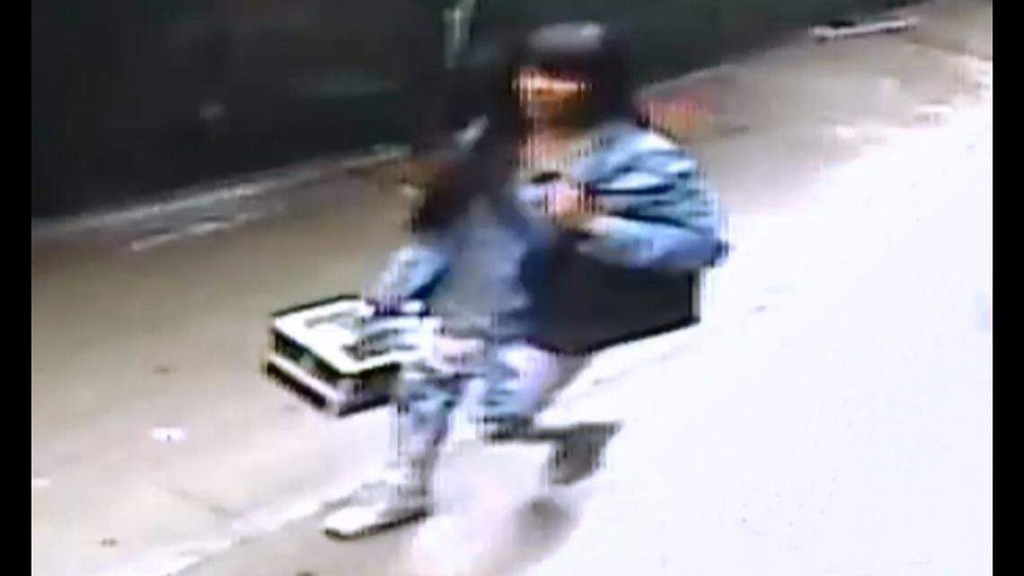 A woman has been charged with hitting a lawyer in the face with a metal makeup box in New York.