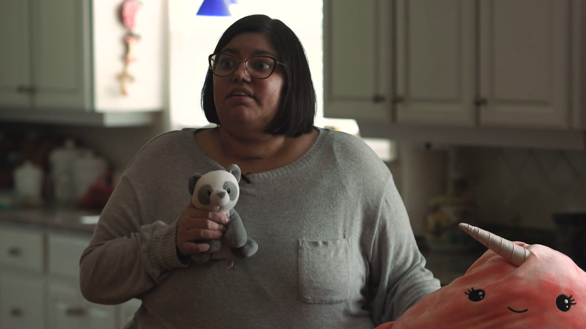 Miranda Reich, 29, shows KGW the two stuffed animals that sat on her windowsill as she fought for her life in the ICU.