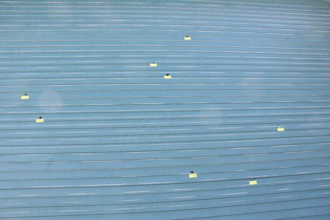 Bullet holes in the Solano County Jail's release door after a shooting at the facility early Tuesday morning.
