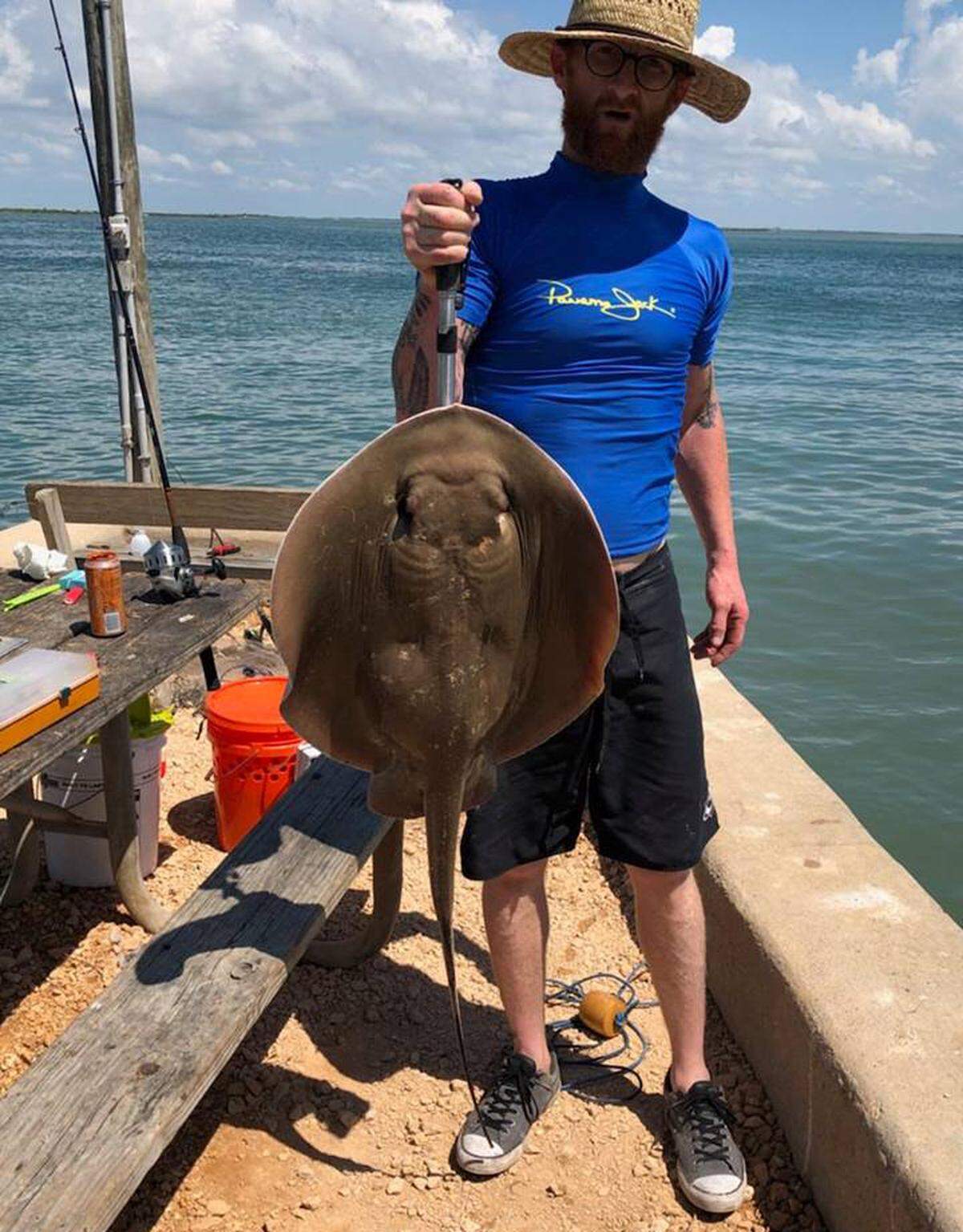 Nicholas Long, of Fort Worth, gets a photo of the mama stingray that he caught along San Luis Pass during Memorial Day Weekend before he lets her go back into the Gulf of Mexico.
