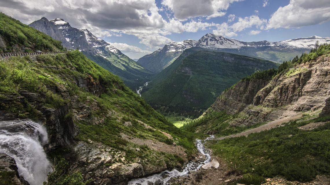 An avalanche swept past a group of three bikers on Glacier National Park. It trapped two on the hillside for hours, separating husband from wife, park officials said. The group was biking on Going-to-the-Sun Road, a 50-mile road that goes through the middle of the park.