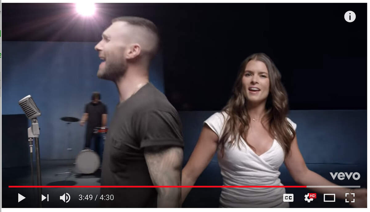 Newly retired NASCAR driver Danica Patrick shows up next to singer Adam Levine in the new video by Maroon 5.