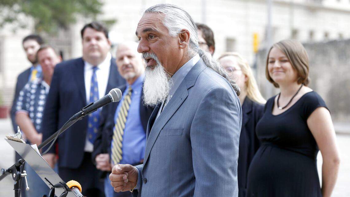 FILE - In this May 1, 2014 file photo, Libertarian party candidate for Texas attorney general Jamie Balagia speaks in front of the Alamo in San Antonio, Texas, about his election platform. Balagia, a Texas lawyer known as the “DWI Dude” has been sentenced to more than 15 years in federal prison for falsely promising Colombian drug traffickers he’d get their charges reduced in exchange for cash. Balagia was sentenced Monday, May, 3, 2021, to 188 months in federal prison. (William Luther/The San Antonio Express-News via AP)