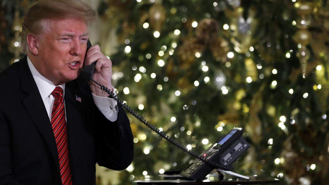 President Donald Trump speaks on the phone sharing updates to track Santa’s movements from the North American Aerospace Defense Command (NORAD) Santa Tracker on Christmas Eve.