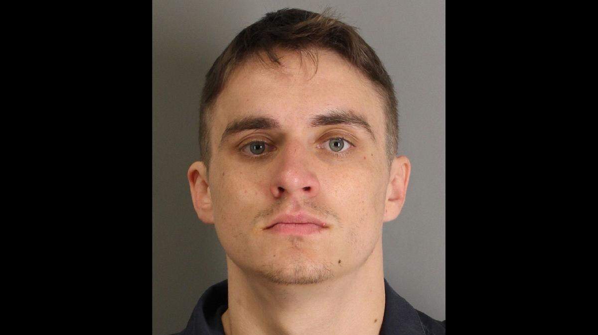Ryan Allen Prajzner, 24, has been charged with robbery after police in Vidor, Texas say he ended up in the hospital with a bruised scrotum trying to run away from a Walmart.