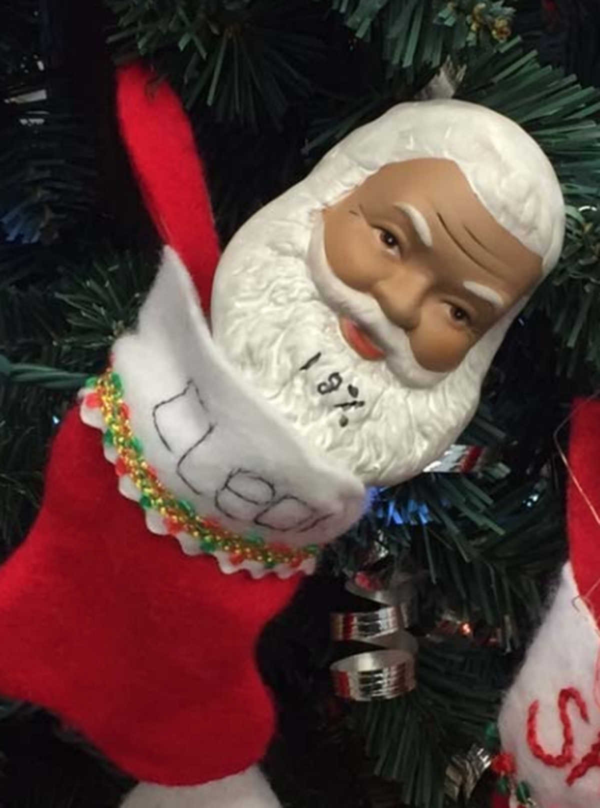 An image of the black Santa that Cleon Brown says coworkers used to taunt him for his DNA results.