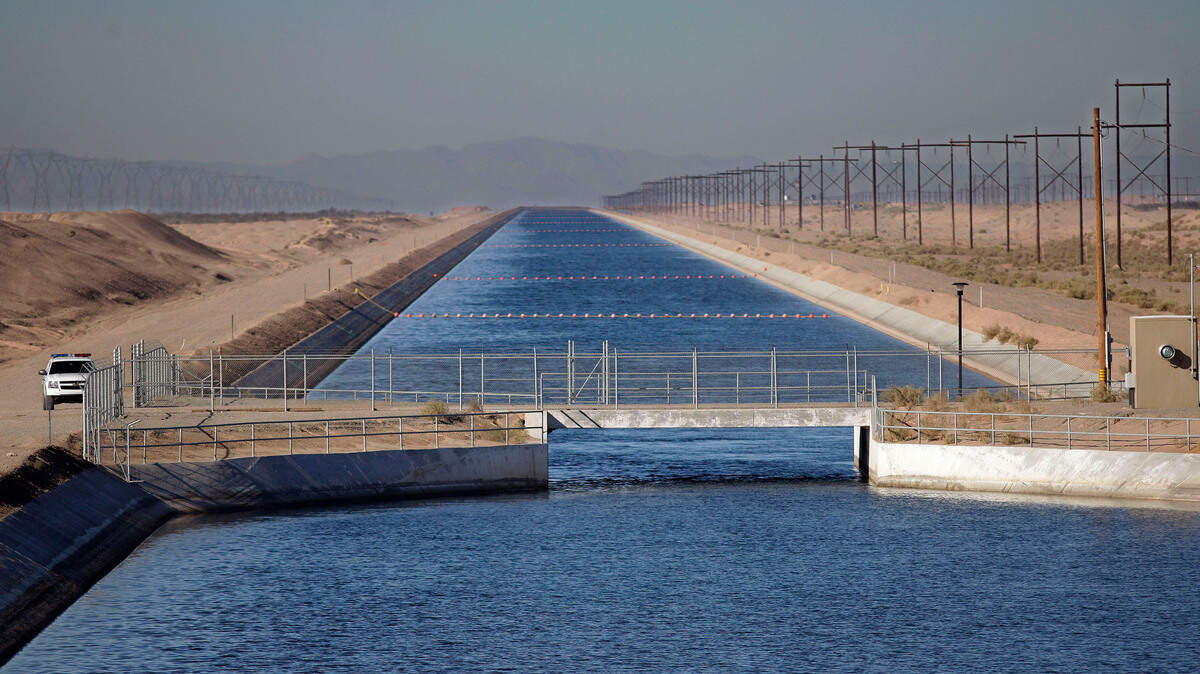 Red buoys can be seen along the width of the All-American Canal near Gordos Well, California. A migrant was found struggling to swim in the canal while trying to enter the U.S.