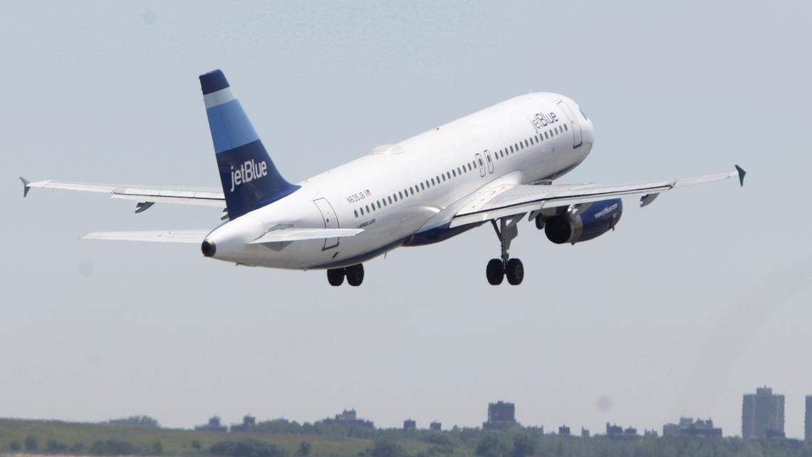 FILE - In this June 2, 2010 file photo, a JetBlue airplane takes off from John F. Kennedy International Airport in New York. A plane flying to Newark, New Jersey, on Nov. 23 was met by authorities following a potential bomb threat, JetBlue said. (AP Photo/Seth Wenig, file)