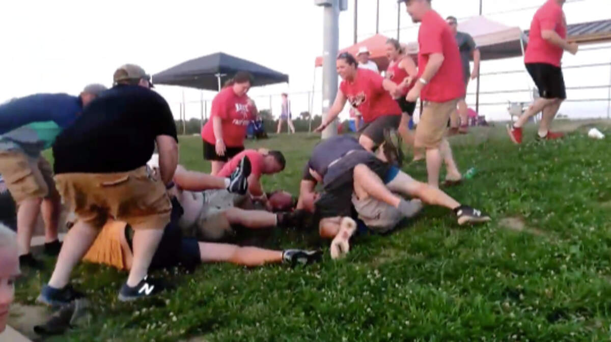 Video captured a brawl that broke out during a youth softball tournament.