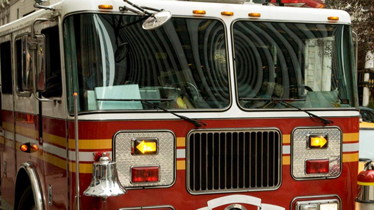 The firefighter was driving home when he got a page for a fire at his own home, outlets report.