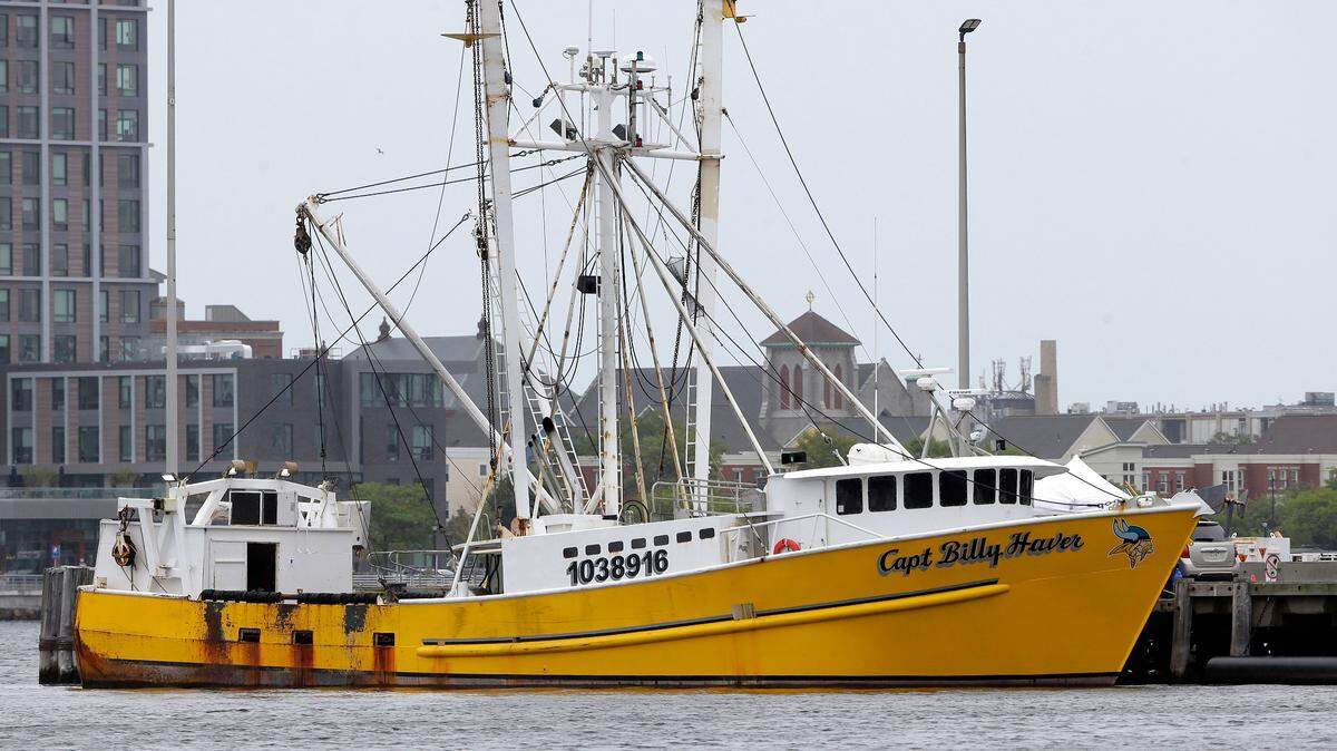 The Virginia-based fishing vessel Captain Billy Haver is docked on Sept. 25 at the U.S. Coast Guard Station in Boston. Crew member Franklin Freddy Meave Vazquez, 27, was indicted on murder charges this week following a rampage that left one dead aboard the boat in September.