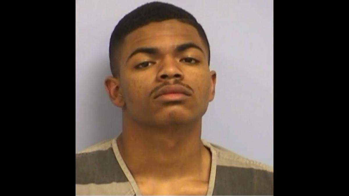 Christian Daniel, 18, remained in the Travis County Jail Wednesday, charged with theft of a firearm and unlawful possession of a firearm.