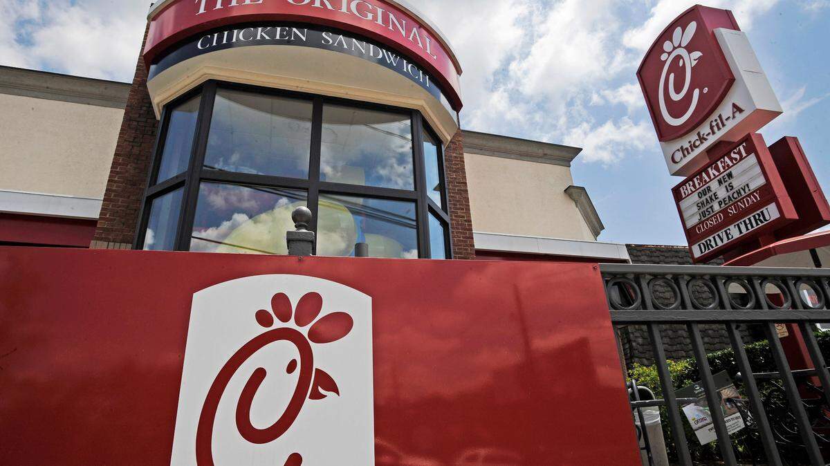 FILE - This July 19, 2012, file photo shows a Chick-fil-A fast food restaurant in Atlanta. A California location of the restaurant could be declared a ‘public nuisance’ because its drive-thru lines spill into a busy street nearby, the Santa Barbara City Council said in during a meeting on March 1, 2022. (AP Photo/Mike Stewart, File)