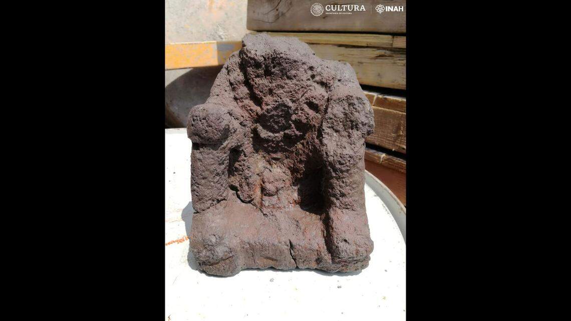 A headless Aztec sculpture that was unearthed from the site.