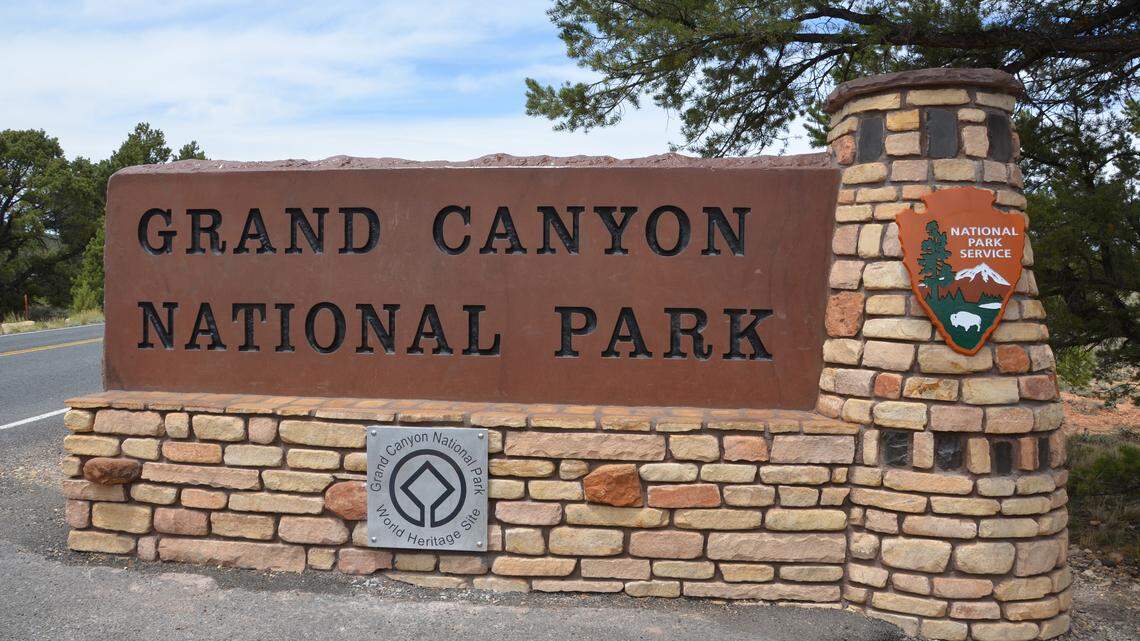Along Highway 64, the East Entrance sign welcomes visitors to Grand Canyon National Park. The National Park Service is searching for women recorded using bathrooms at Grand Canyon after maintenance worker was accused of filming visitors, officials said.