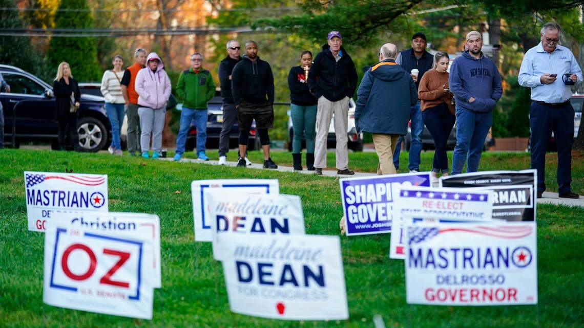 Voters wait in line to cast their ballots in the midterm election in Rydal, Pa., Tuesday, Nov. 8, 2022.
