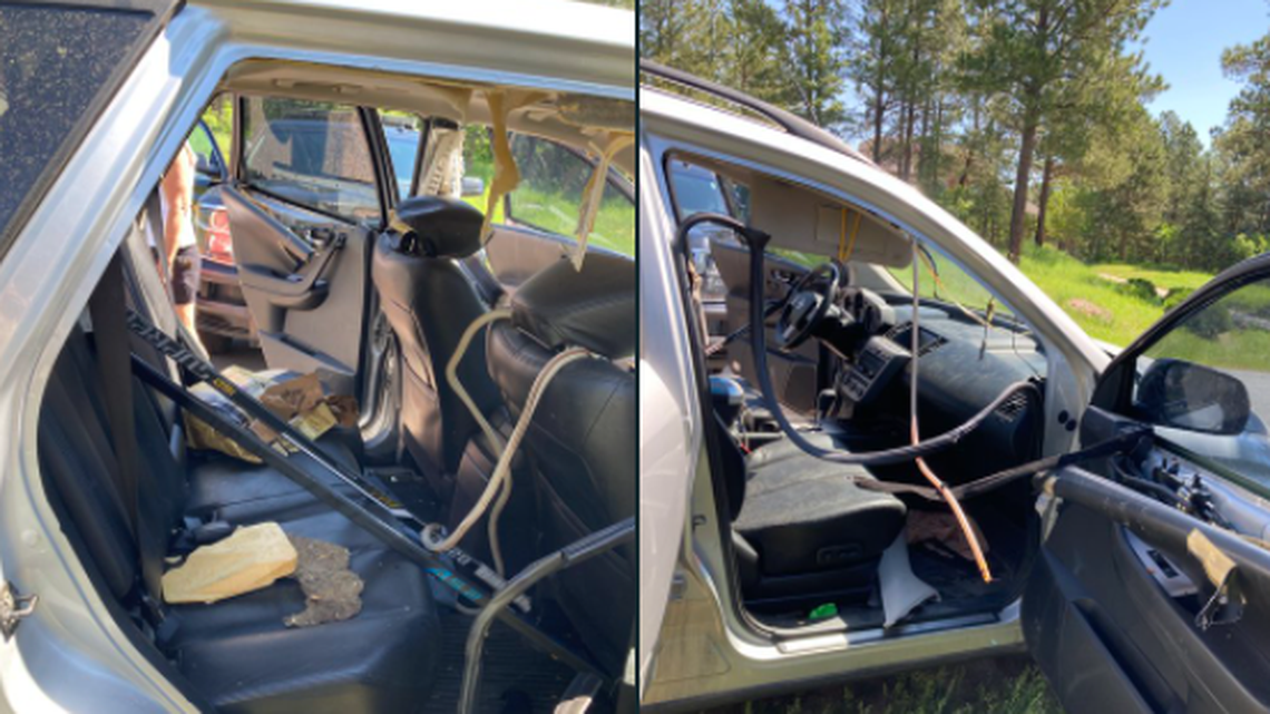 A bear was in a car in Larkspur, Colorado, for at least an hour and trashed the interior, wildlife officials said.
