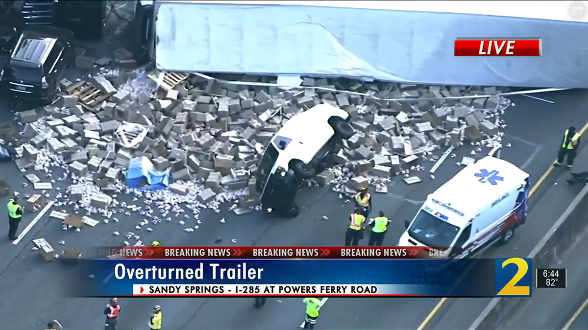 A tractor-trailer carrying around 40,000 pounds of raw chicken crashed, causing its content to spill out on I-285 in Georgia.