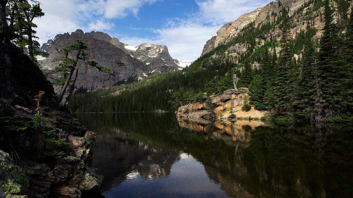 Rocky Mountain National Park visitors found the body of a 33-year-old woman below a popular hiking trail, The Loch.