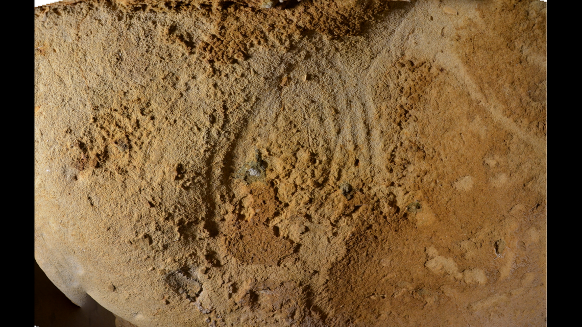 Scientists said the finger markings followed the shape of the cave’s walls.