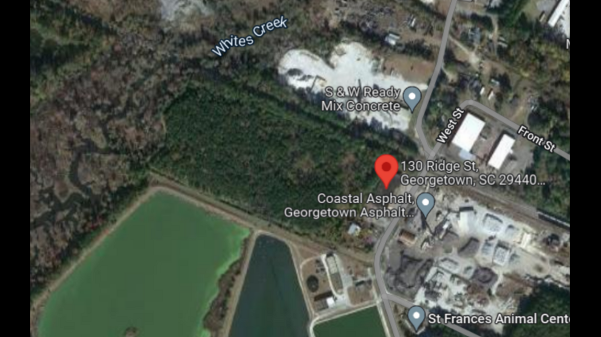 Bones found under brush in a wooded area identified as those of missing man, South Carolina officials say.