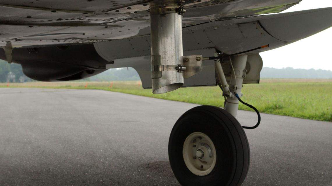 This undated photo courtesy of USDA APHIS/R. Anson Eaglin shows a chute attached to the bottom of a plane in Beckley, West Virginia. Oral rabies vaccination baits are dispensed through a chute under the aircraft during fly overs of specific areas. To cut down on rabies in wildlife, the U.S. Department of Agriculture’s Wildlife Services Program distributes rabies vaccine cubes by air and ground.