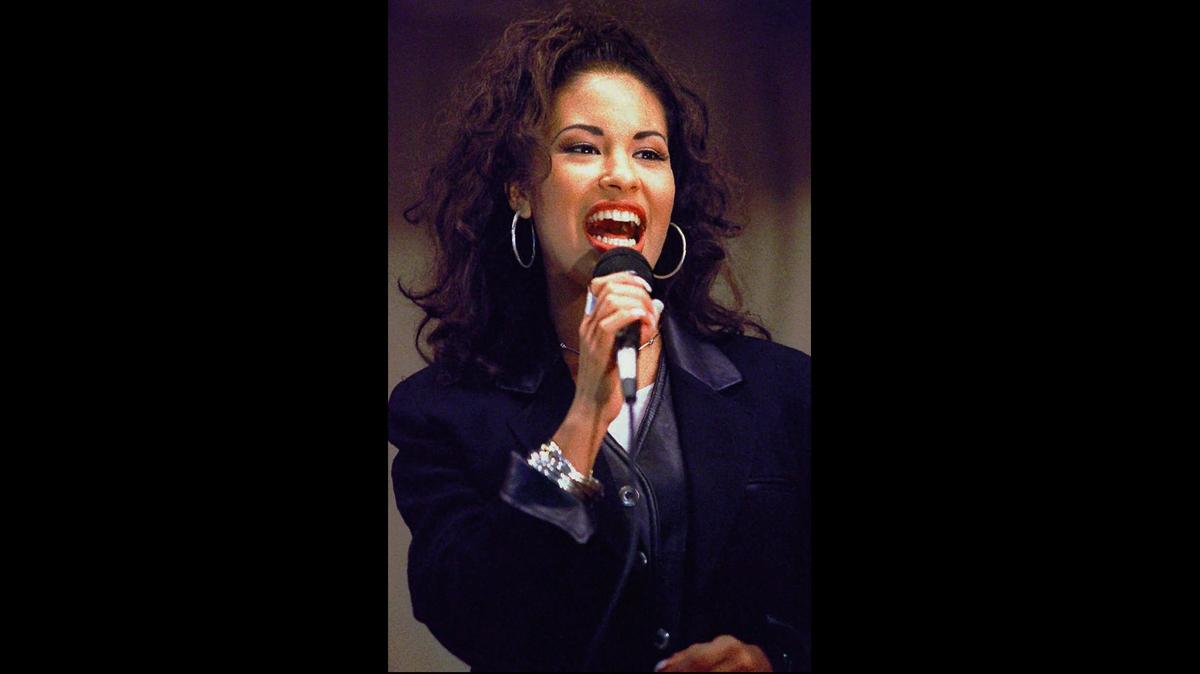 Selena Quintanilla’s father is suing a cruise company after he said it used a trademarked image of his daughter’s signature without permission.