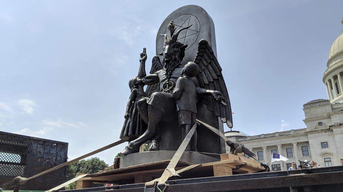 The Satanic Temple unveils its statue of Baphomet, a winged-goat creature, at a rally for the first amendment in Little Rock, Ark., on Aug. 16, 2018.