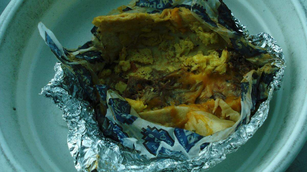 A TSA agent at a Houston airport discovered a lump of crystal meth inside of a traveler’s breakfast burrito during a security check, officials say. Photo from TSA SouthWest on Twitter.