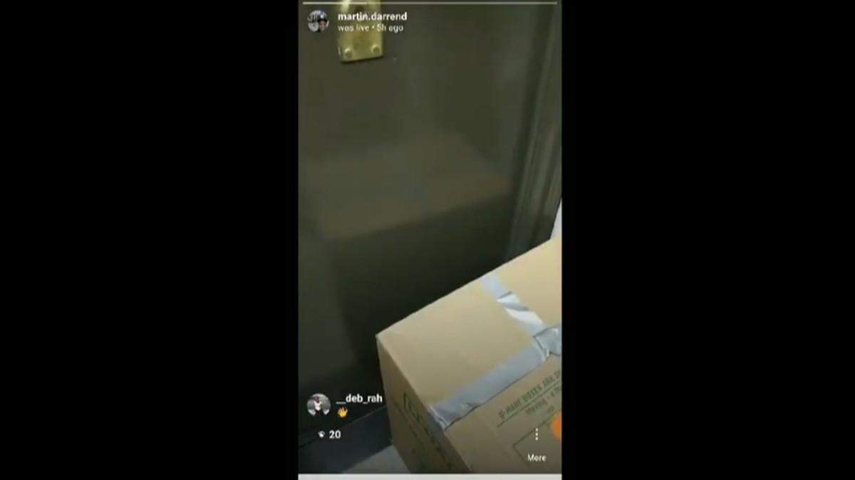 Darren Martin says he was confronted by police officers while he was moving into his apartment.
