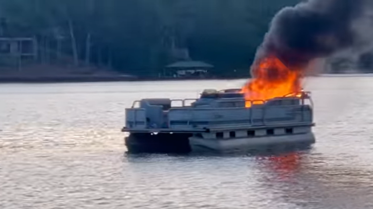 Six family members were saved after their pontoon boat burst into flames on a South Carolina lake, an official said.