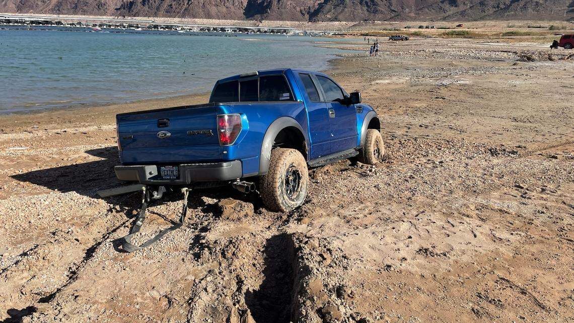 A truck got stuck in the soft shoreline as drought is causing Lake Mead to shrink.