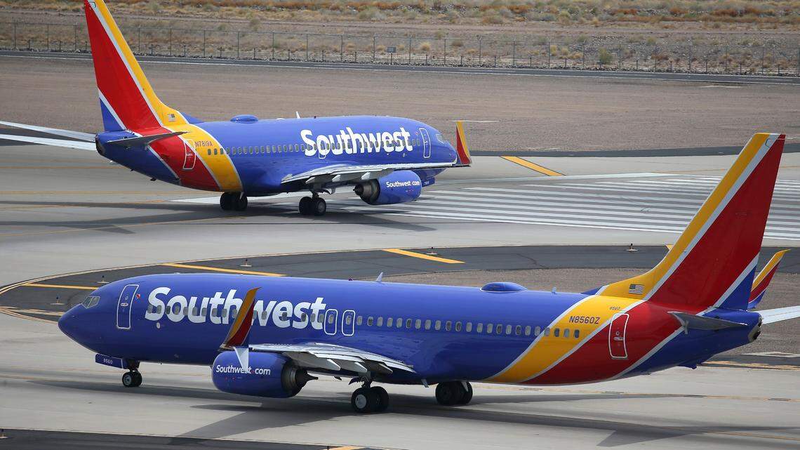 FILE - This July 17, 2019 file photo shows Southwest Airlines planes at Phoenix Sky Harbor International Airport in Phoenix. On Nov. 22, 2021, the Federal Aviation Administration proposed that a Southwest passenger be fined $40,623 for their behavior on a flight. (AP Photo/Ross D. Franklin, File)