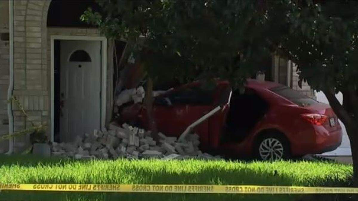 This car crashed and pinned Elizabeth Lugo to a home in Katy, Texas.