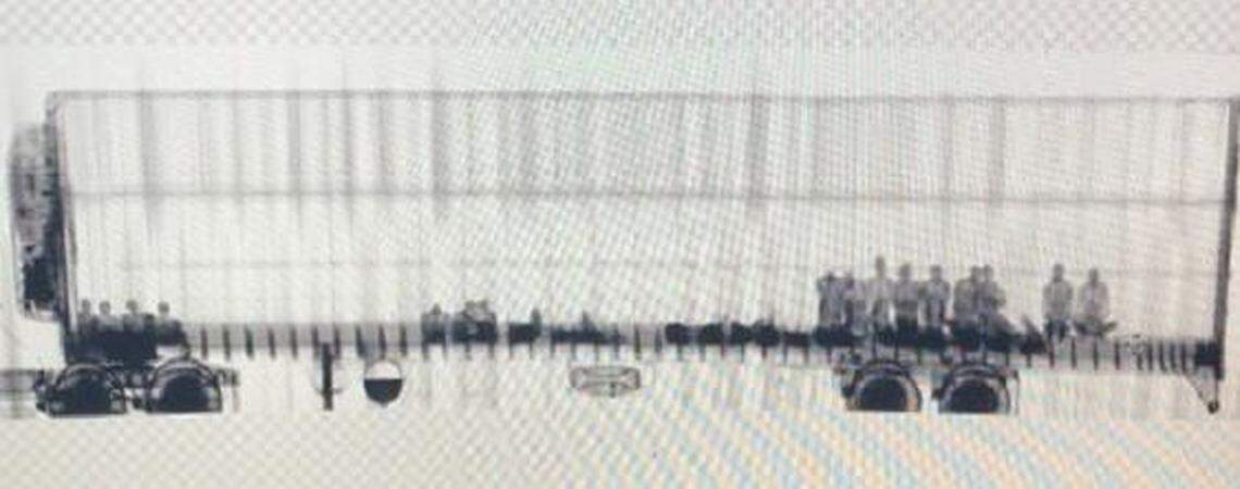 The scan of a truck shows humans smuggled in Arizona. from Mexico in September, U.S. border agents said.