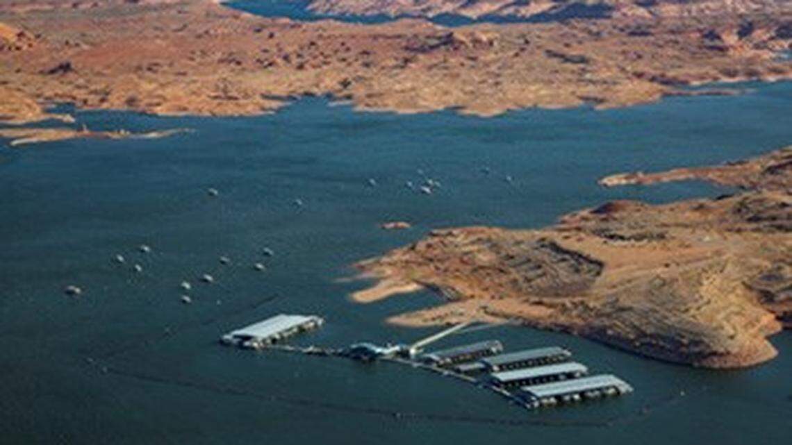 A dad on vacation from California jumped into Lake Powell to save his child struggling in the water, Glen Canyon officials say.