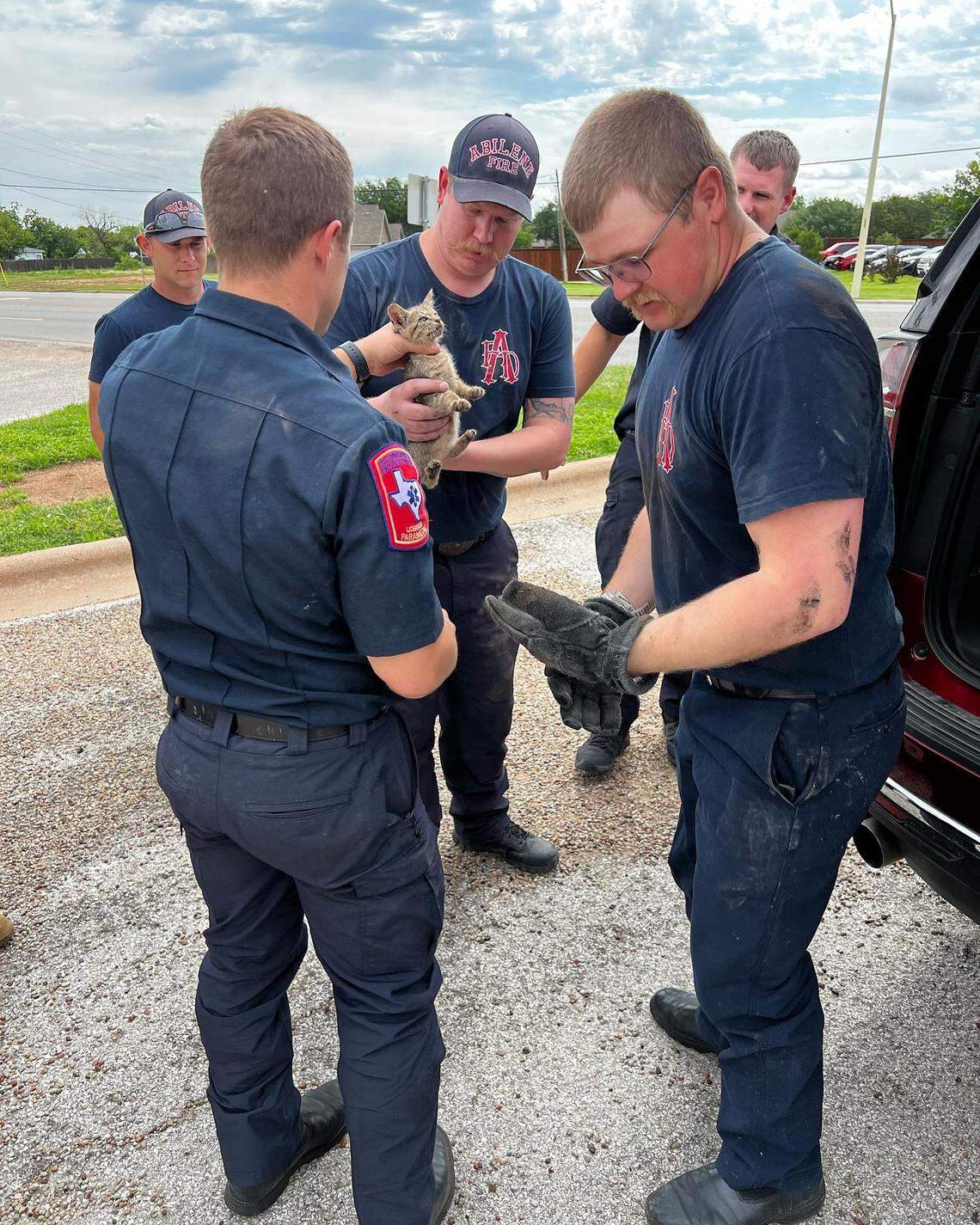 One of the firefighters decided to keep the furry freeloader.