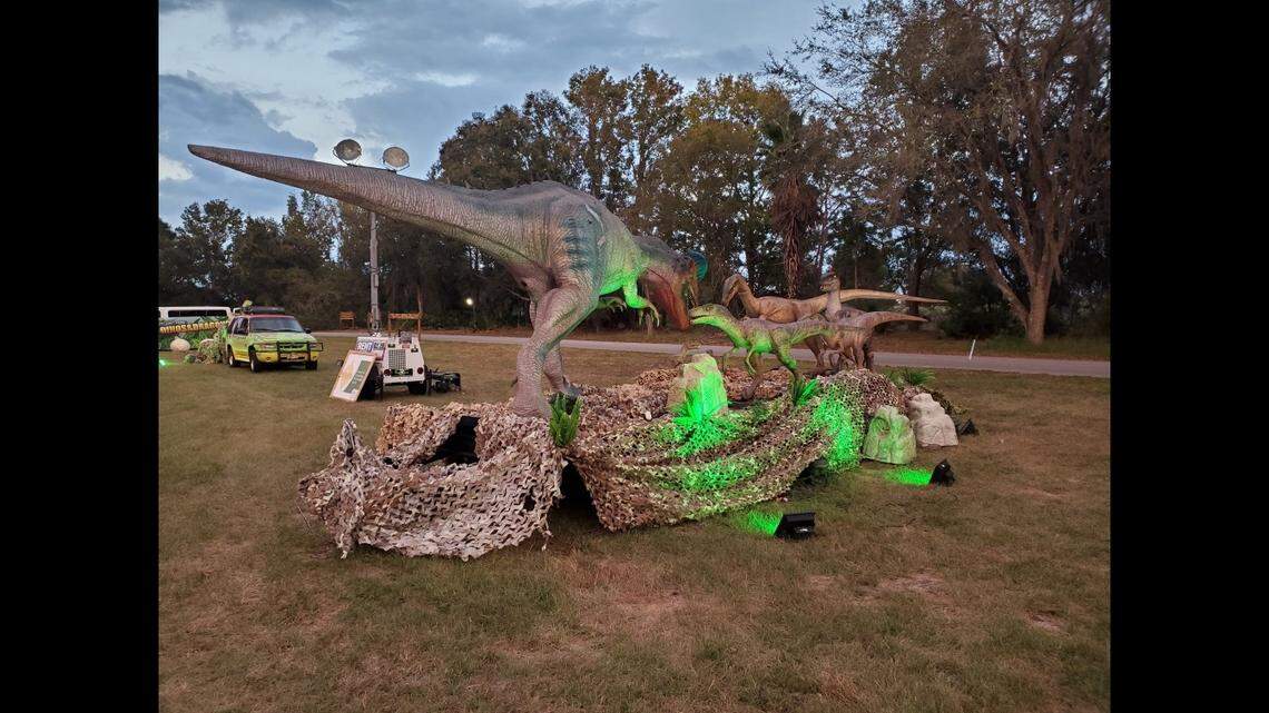 A dinosaur, the one directly to the right of the large dinosaur in the above photo, was stolen from a Florida museum on Halloween night.