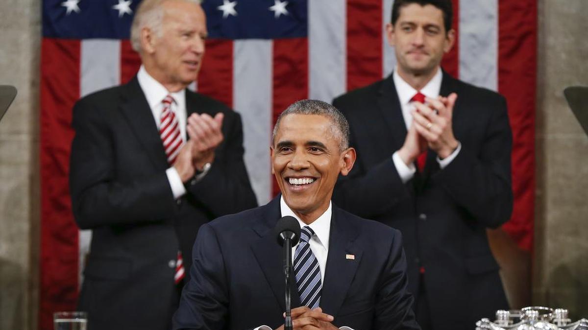 Vice President Joe Biden and Speaker Paul Ryan of Wisconsin applaud President Barack Obama during the State of the Union address before a joint session of Congress on Capitol Hill in Washington, Tuesday, Jan. 12, 2016.
