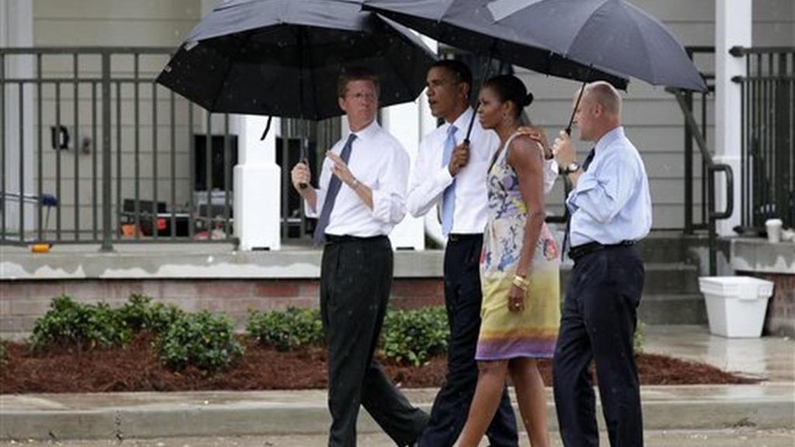 
In this photo taken Aug. 29, 2010, President Barack Obama, first lady Michelle Obama, then-Housing and Urban Development Secretary Shaun Donovan, left, and New Orleans Mayor Mitch Landrieu, right, tour Columbia Parc Development in New Orleans on the fifth anniversary of Hurricane Katrina. 
