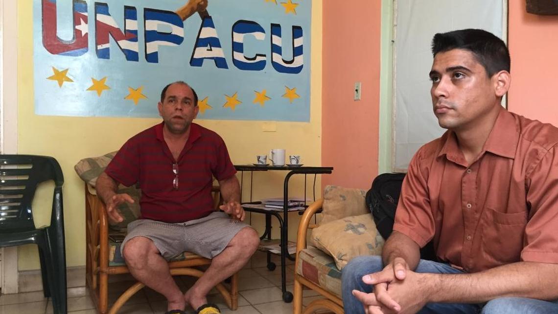 Activists Arcelio Rafael Molina Leyva and Carlos Amel Oliva discuss human rights in Cuba from the offices of the Cuban Patriotic Union in Havana.