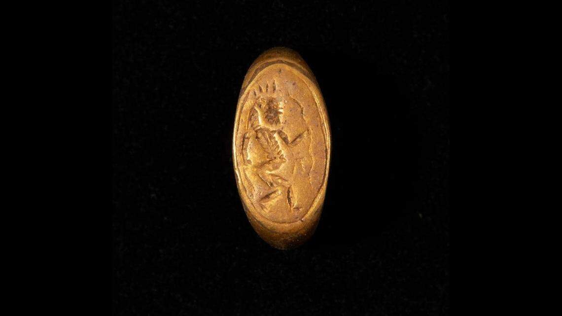 One of the rings depicts “Bas,” the ancient Egyptian god of fun.