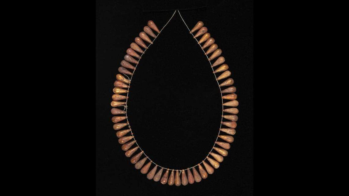 A gold hollow-bead necklace was among the antiquities found.