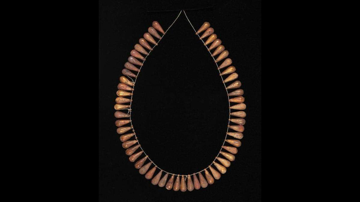 A gold hollow-bead necklace was among the antiquities found.