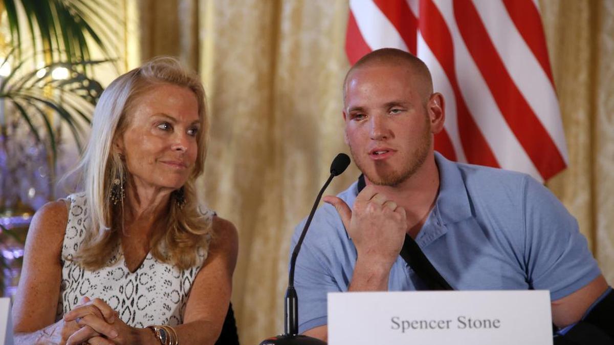 
U.S. Airman Spencer Stone and Jane D. Hartley, U.S. Ambassador to France, answers questions during a press conference at the ambassador’s residence in Paris on Sunday, Aug. 23, 2015. Stone and two friends, Antony Sadler and Alek Skarlatos, helped foil a potentially deadly attack when they subdued a man armed with an assault rifle and other weapons on board a high-speed train bound for Paris two days ago. The man was known to intelligence services in three countries and had ties to radical Islam, authorities said Sunday. 
