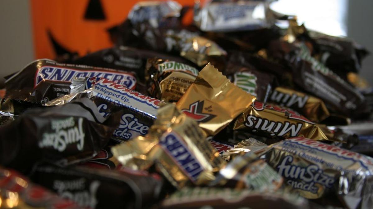"Fun Size" and "Mini" candies are seen in this Sept. 30, 2007 photo. Shoppers trawling the candy aisle as Halloween approaches might be excused from feeling overwhelmed, as candy makers are producing more size, shape, and flavor varieties for well-known brands than ever before.
