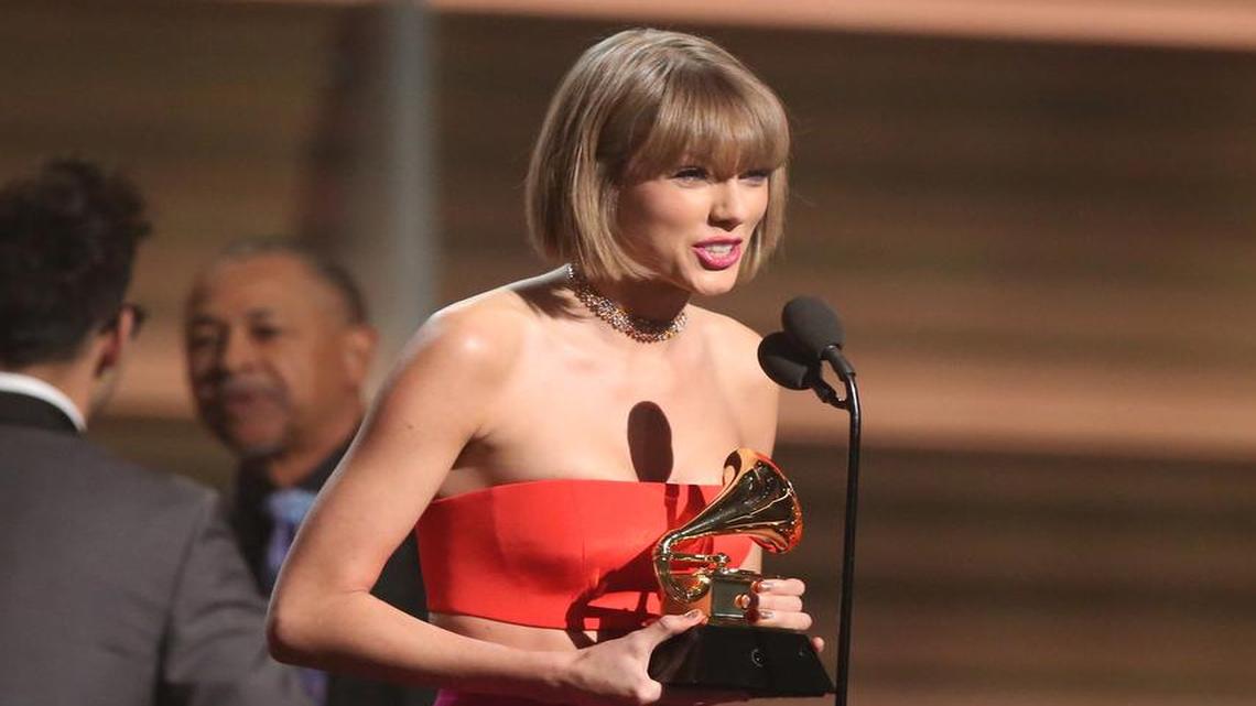 Taylor Swift accepts the award for album of the year for “1989.”
